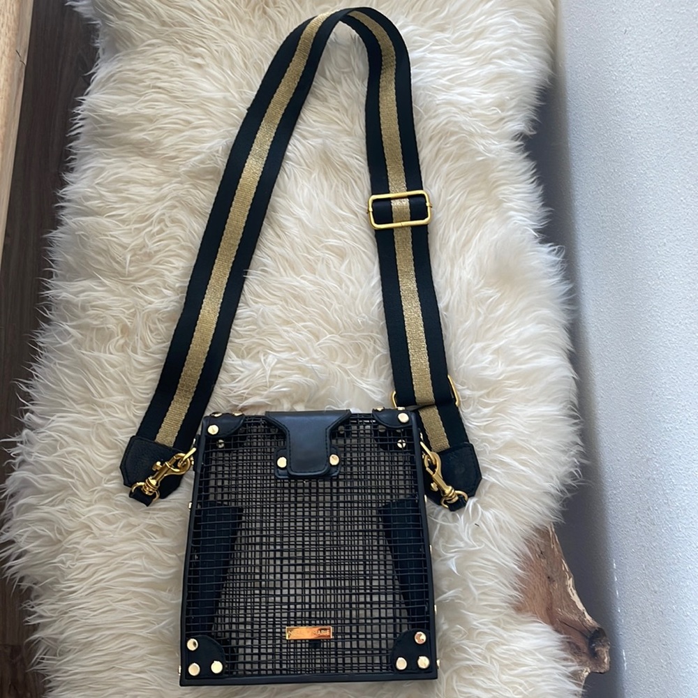 Filipino local brand Mele + Marie black metal shoulder bag with gold hardware